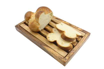 Rechteckiges Brotschneidebrett aus Olivenholz mit Krümelfänger